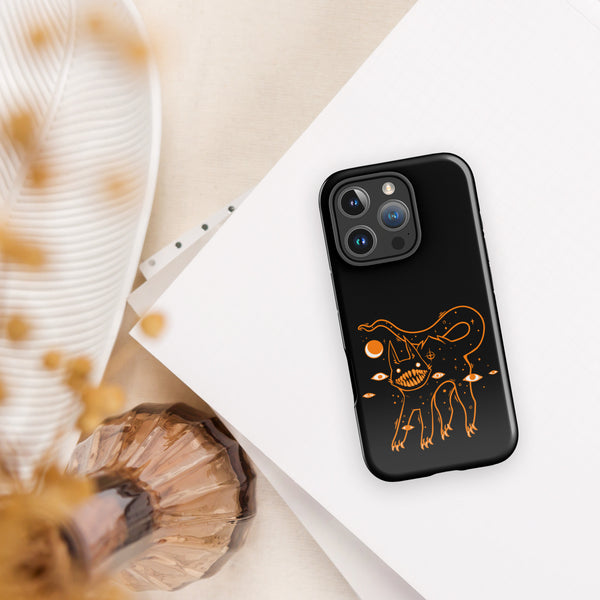 Black cat phone case for iPhone® featuring an original illustration with big teeth and a celestial design. Durable and stylish.