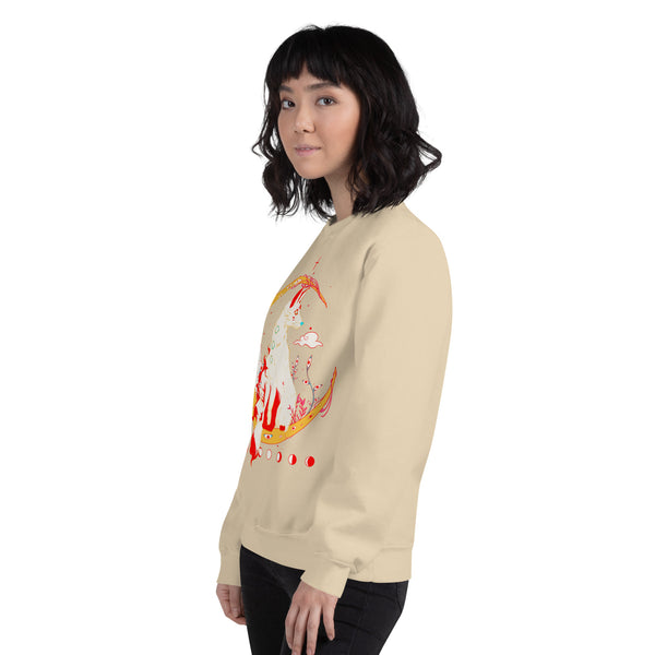 Person wearing a beige unisex sweatshirt with a kitsune fox illustration inspired by Japanese mythology.