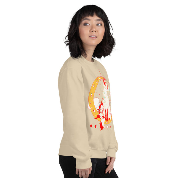 Woman wearing a beige unisex sweatshirt with a kitsune fox illustration inspired by Japanese mythology.