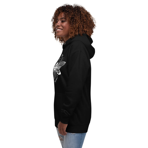 Unisex hoodie with illustrated witchy moth design, front pouch pocket, and matching drawstrings, modeled on smiling person.