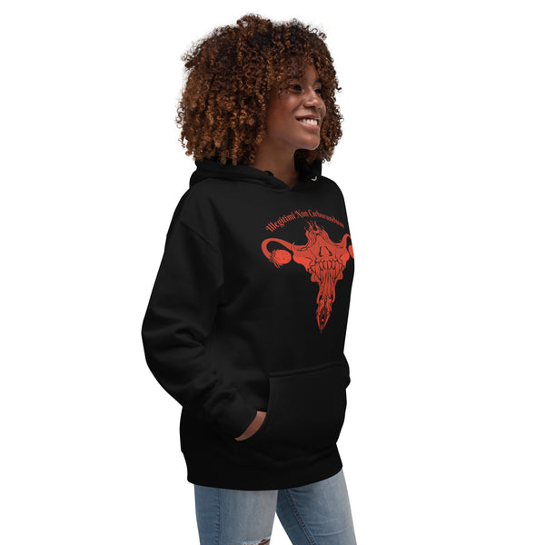 Unisex Illegitimi Non Carborundum hoodie with uterus design, model smiling in black sweatshirt.