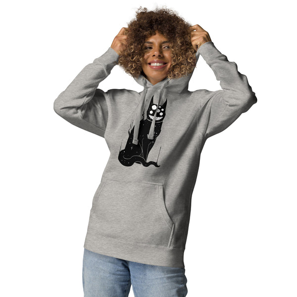 Gray hoodie featuring a black cat design with a glowing grin and multiple eyes, modeled by a smiling person, perfect for fans of mystical and gothic fashion.