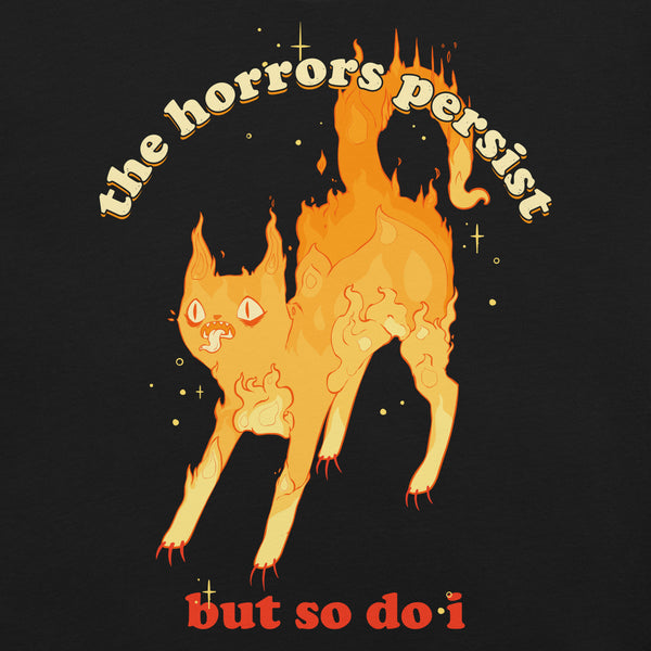 Goth unisex T-shirt with fire cat illustration and "The horrors persist but so do I" quote, perfect for witchy, alt, and gothic styles.