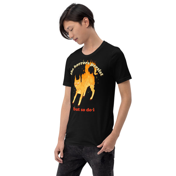 Unisex t-shirt with fire cat illustration and "The horrors persist but so do I" quote, perfect for goth, alt, witchy, and gothic style.