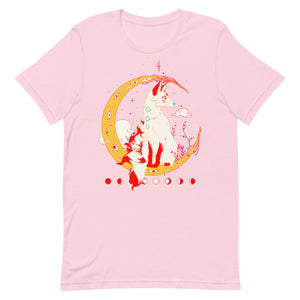 Women and men in soft pink t-shirt featuring original kitsune fox artwork with moon design.