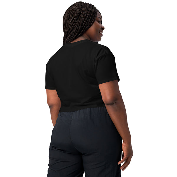 Woman wearing Luna Moth Relaxed Crop Top in black, rear view showing casual fit and comfortable style