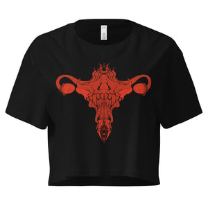 Black relaxed crop top with hand-drawn death metal uterus artwork in red, perfect for alt or witchy aesthetic, made of 100% combed cotton.