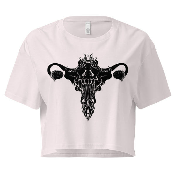 White crop top with hand-drawn death metal uterus artwork, perfect for alt or witchy aesthetics, made of soft 100% combed cotton.